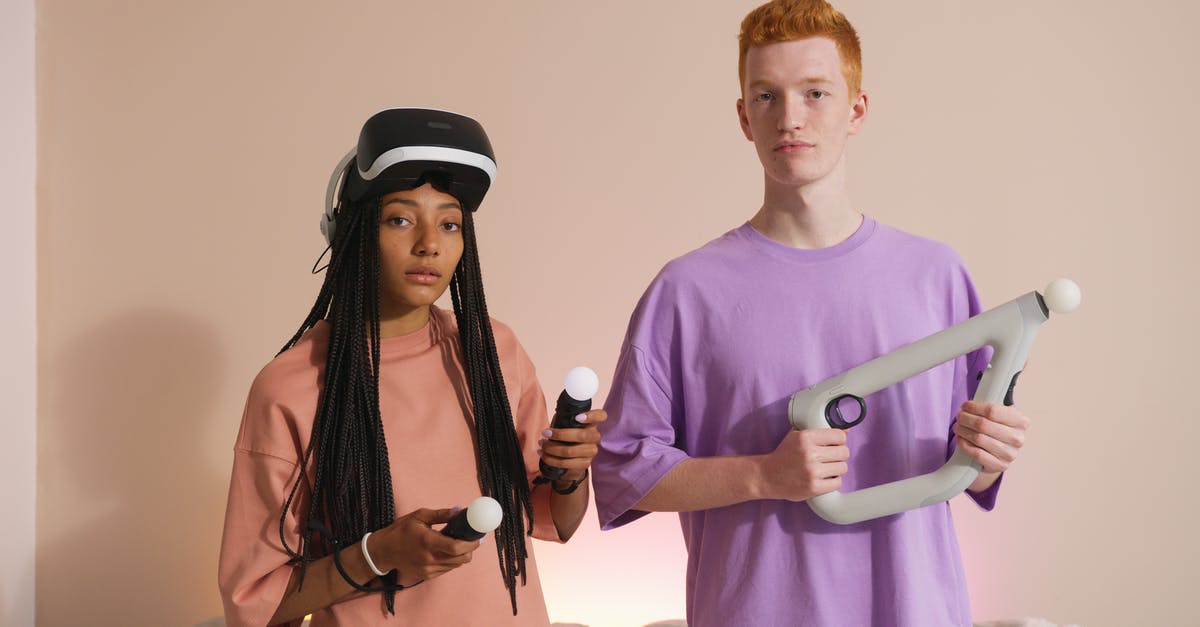 ps3 controller not syncing - Man in Blue Crew Neck Shirt Beside Woman in Black and White Stripe Dress