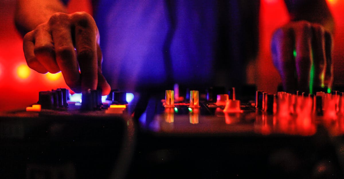 ps3 controller not turning on or syncing - A Person Playing the Dj Mixer