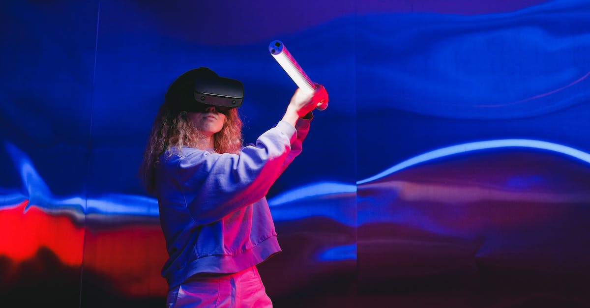 ps3 controller not turning on or syncing - Woman in Pink Long Sleeve Shirt and Black Cap Holding Red Light