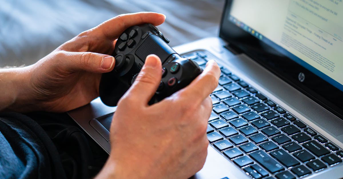 PS3 Controller wont sync wireless and tethered. Is recognised on PC - Person Holding Black Game Controller PS3 Controller wont sync wireless and tethered. Is recognised on PC - Person Holding Black Game Controller