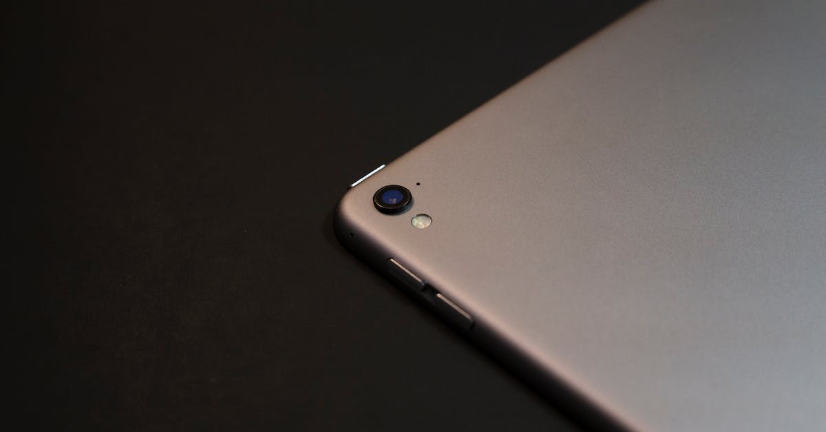 PS3 copy video files from BD-R to HDD - Modern tablet on black background in office