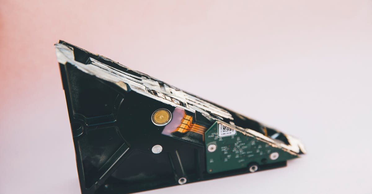 PS3 Hard drive corrupted file system. Stuck in safe mode "preparing" message - Black and Green Computer Hard Disk Drive