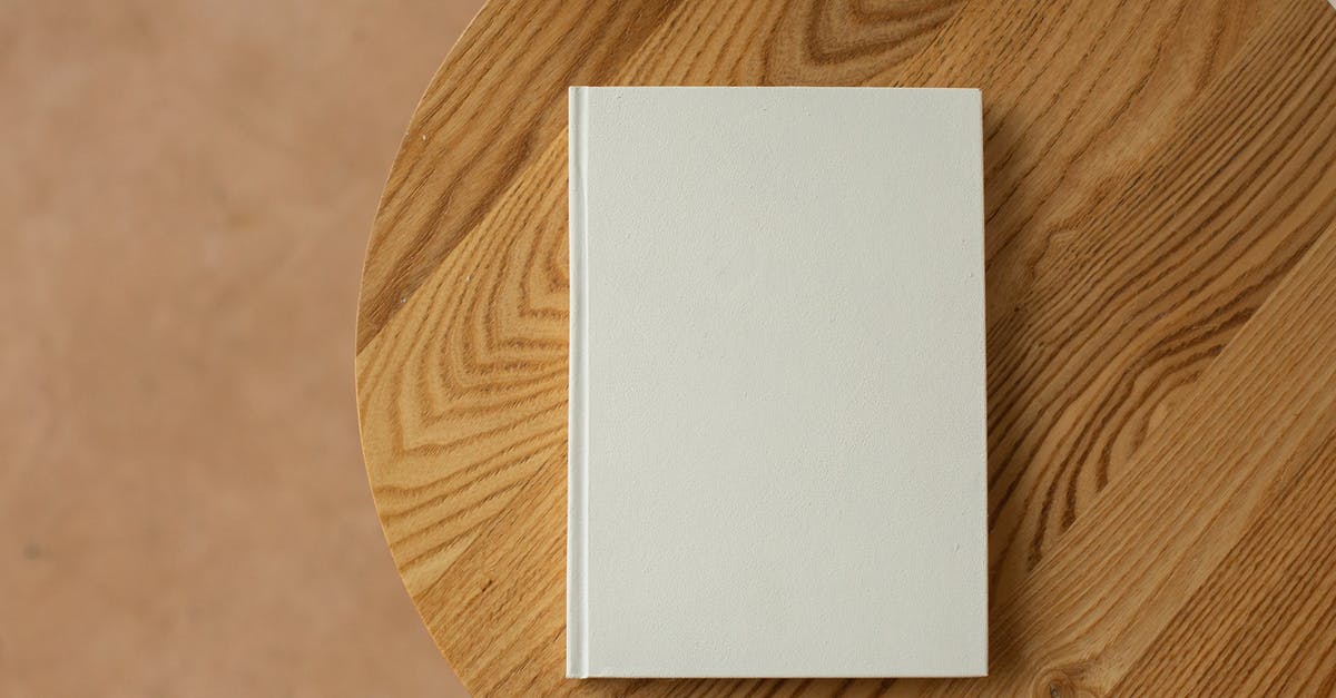 PS4: copy/paste text in messages - Empty white book on wooden table PS4: copy/paste text in messages - Empty white book on wooden table
