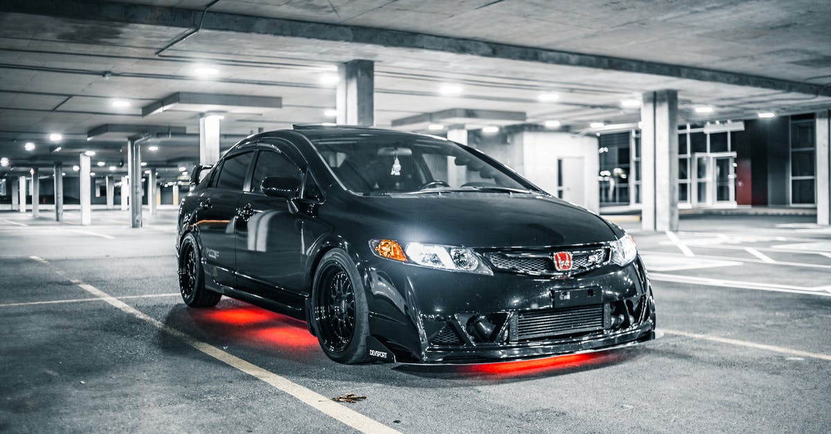 Ps4 disc drive broke - Modern black automobile with glowing headlights and illumination in underground parking lot with marking lines and columns in evening time Ps4 disc drive broke - Modern black automobile with glowing headlights and illumination in underground parking lot with marking lines and columns in evening time