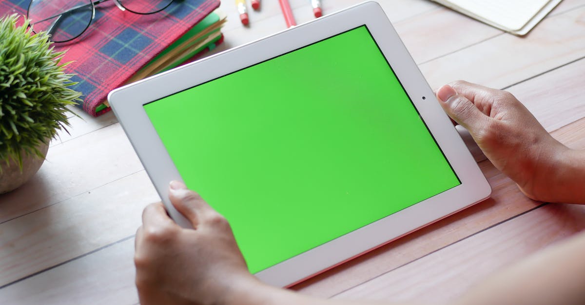 Psionics in XCOM (ipad version) - Close-Up Shot of a Person Holding a Tablet