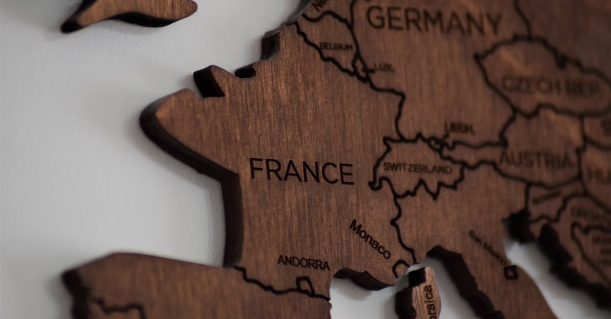 PSN Germany to Belgium transfer - Close-Up Photo of Wooden Jigsaw Map PSN Germany to Belgium transfer - Close-Up Photo of Wooden Jigsaw Map