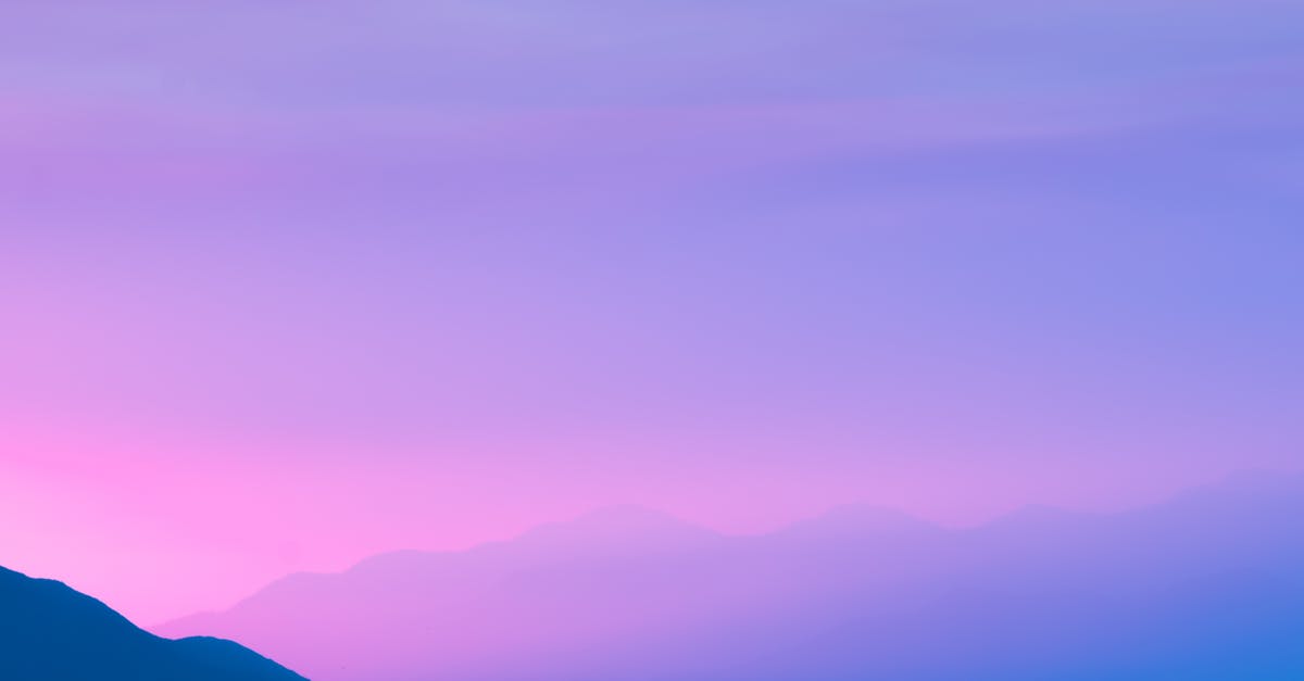 Purple sky in Spore - Silhouette Photo of a Mountain during Sunset Purple sky in Spore - Silhouette Photo of a Mountain during Sunset