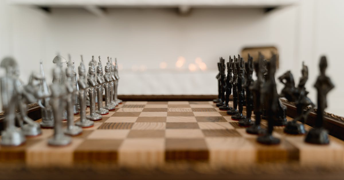Puyo Puyo optimal strategies? - Black Glass Bottles on Brown Wooden Table