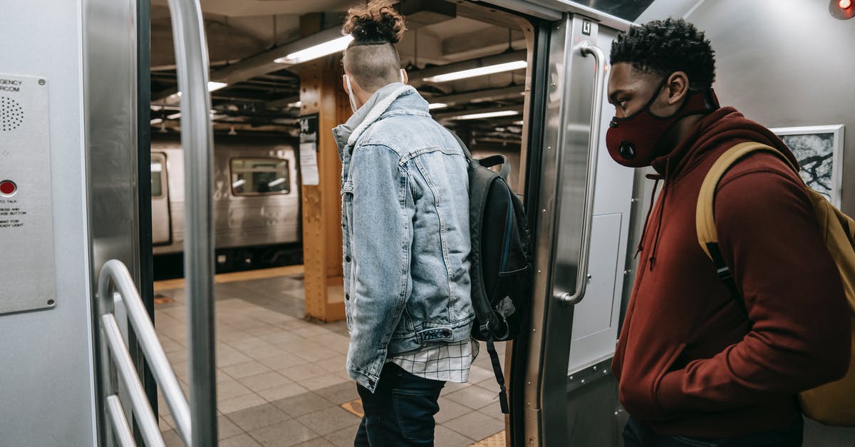 "Off the Record" mission not showing in terminal - Anonymous diverse passengers with rucksacks getting off subway "Off the Record" mission not showing in terminal - Anonymous diverse passengers with rucksacks getting off subway