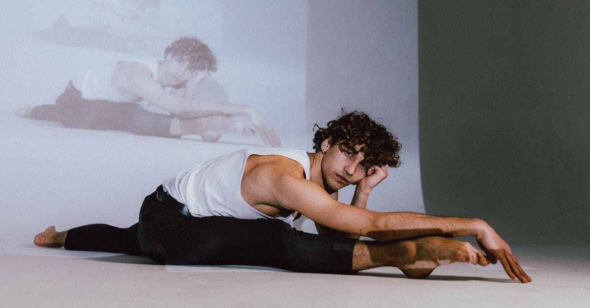 "Starter" moves on evolved Pokémon - Man in Black Tank Top Doing Leg Split