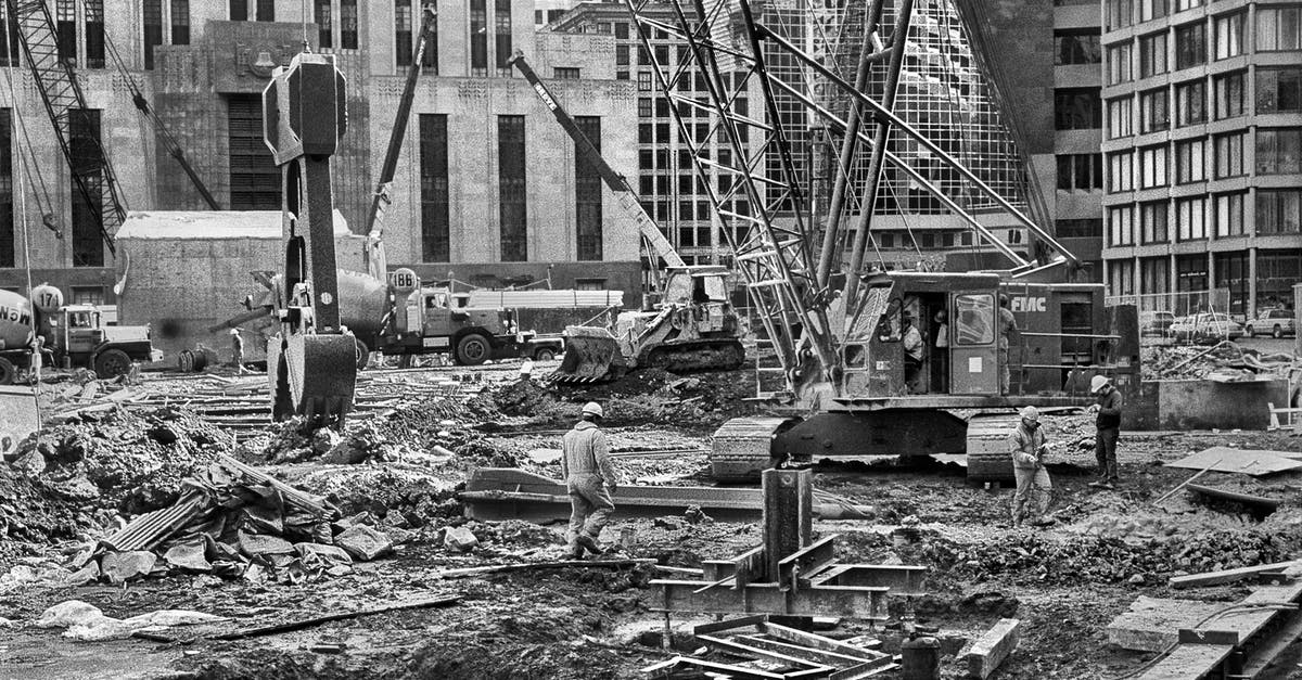 "There is no builder hero in the team." What is a builder hero? - Unrecognizable workers on industrial construction in city "There is no builder hero in the team." What is a builder hero? - Unrecognizable workers on industrial construction in city
