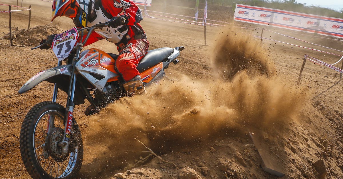 Racing wheel pulls to the right / How to fix? - Man Riding Motocross Dirt Bike on Dirt Road
