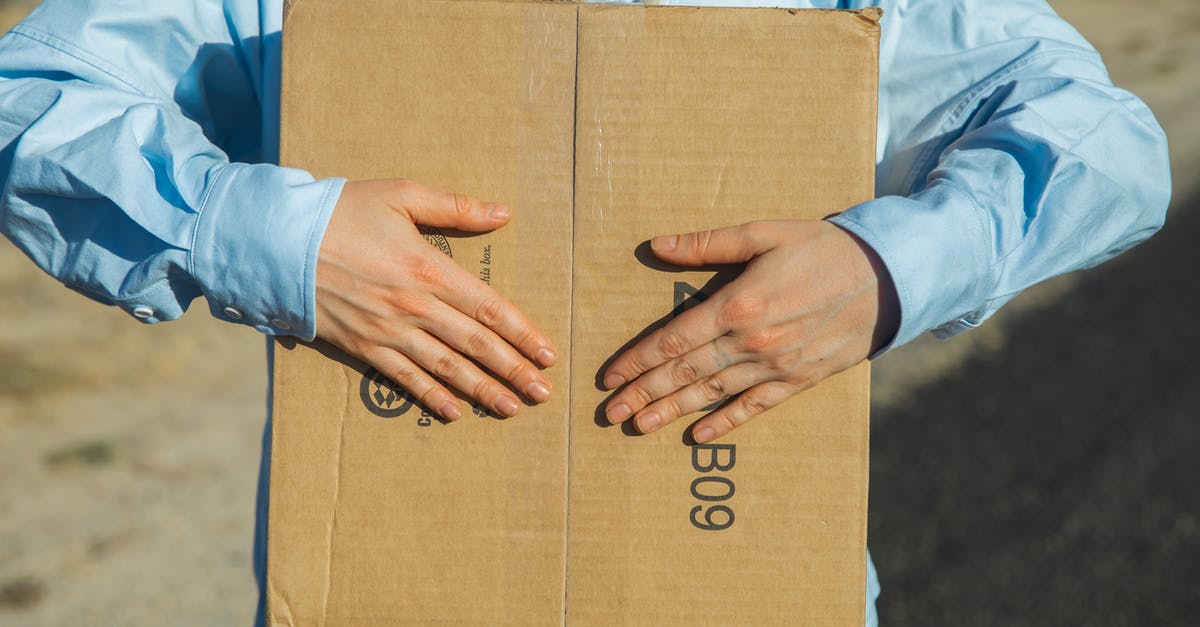 Radeon Pack Bundle - Wolfenstein 2 and Prey Code Delivery Method - Person in Blue Long Sleeve Shirt Holding Brown Cardboard Box Radeon Pack Bundle - Wolfenstein 2 and Prey Code Delivery Method - Person in Blue Long Sleeve Shirt Holding Brown Cardboard Box