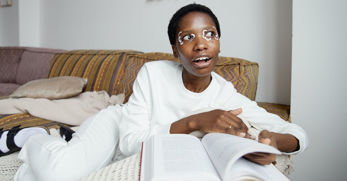 Reading ninjas' attacks on NG+ - Man in White Long Sleeve Shirt Sitting on Brown and White Couch