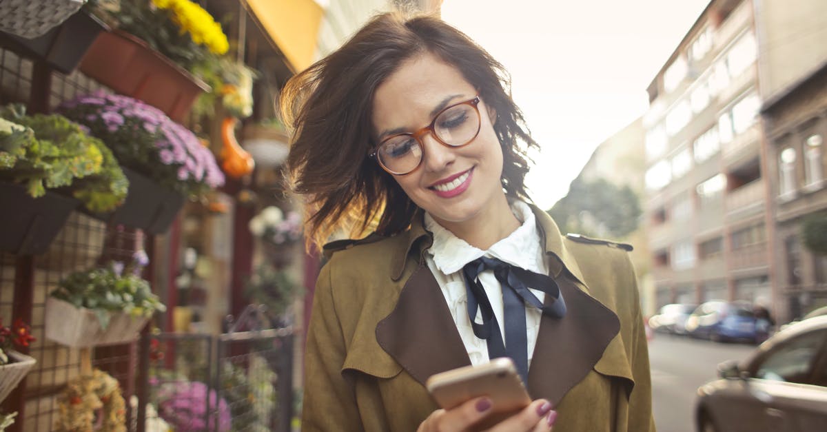Rebuild 3: Do these buildings have any uses? - Woman Beside Flower Shop Using Smartphone Rebuild 3: Do these buildings have any uses? - Woman Beside Flower Shop Using Smartphone