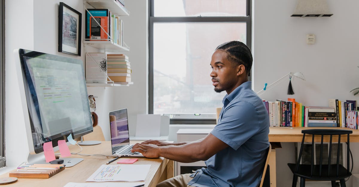 Redemption not working in my own turn? - Man working at desk with computers in office
