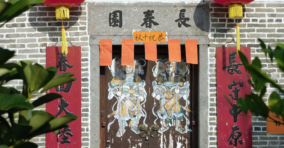 Reincarnate a minion with the Ancestral Spirit deathrattle - Exterior of old Chinese house with hieroglyphs and red paper lanterns