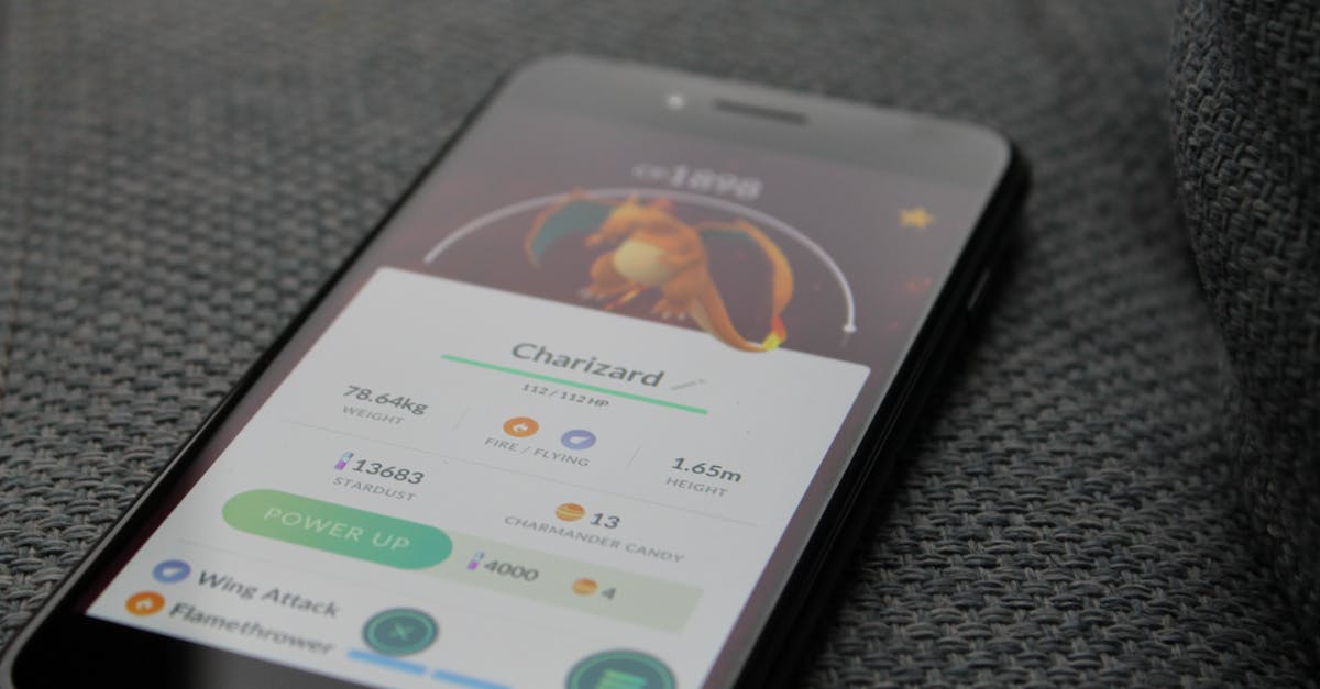 Releasing a pokemon - Turned-on Iphone Displaying Pokemon Go Charizard Application