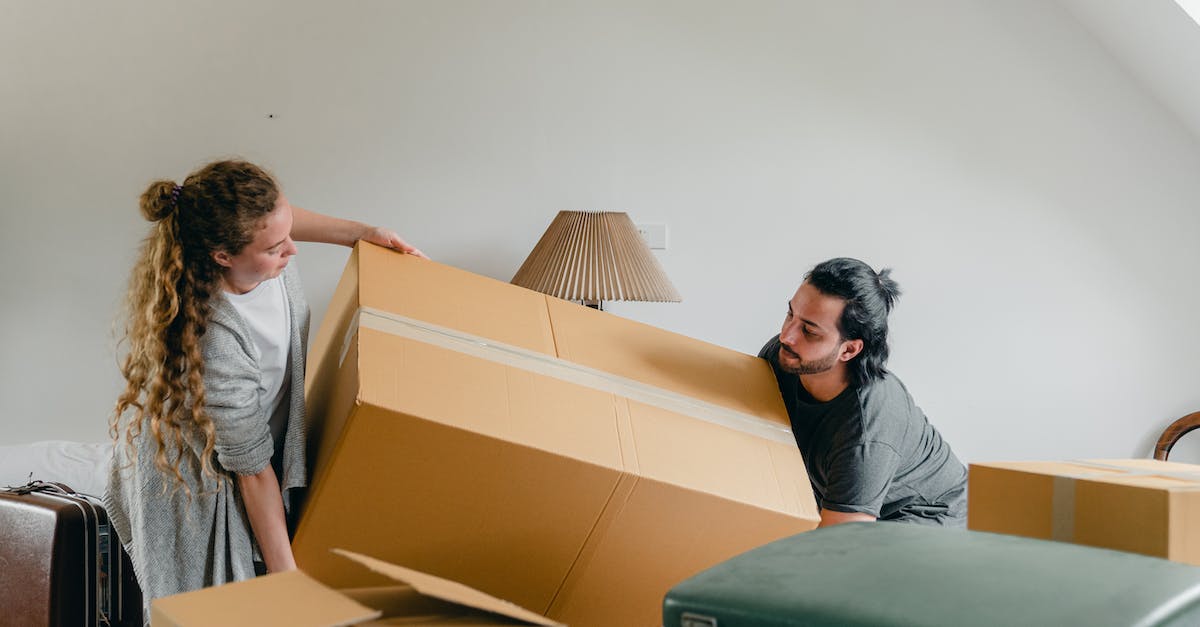 Remove donated troops during preparation phase - Man and woman carrying carton box