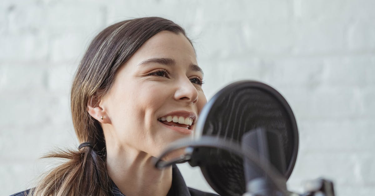 Remove host from host map in Hacknet - Positive female recording podcast on mic while working in light studio against white brick wall Remove host from host map in Hacknet - Positive female recording podcast on mic while working in light studio against white brick wall