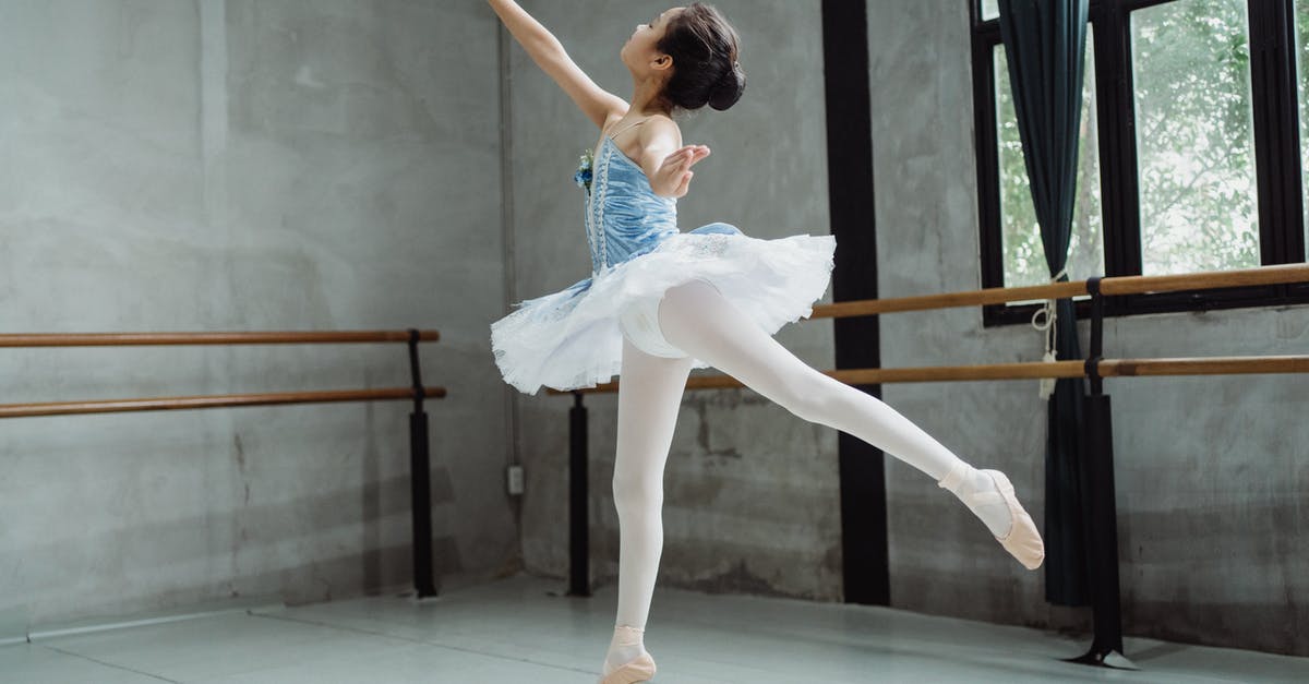 Reset Skill Points - Ballerina girl performing ballet jump in studio Reset Skill Points - Ballerina girl performing ballet jump in studio