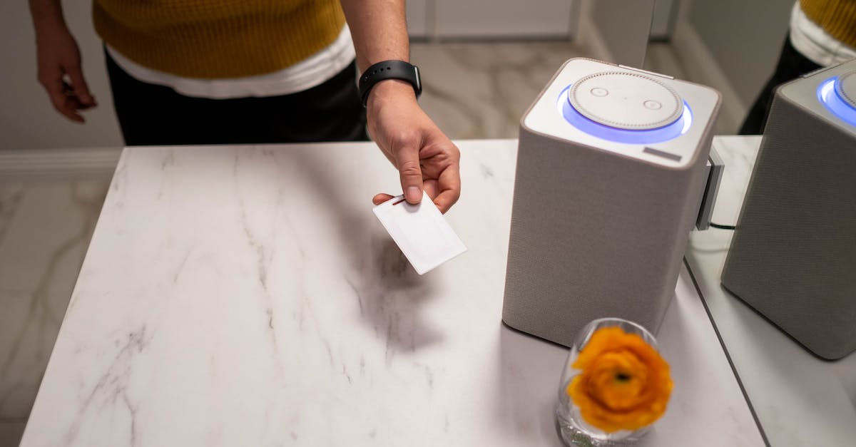 Returning a Card to hand & Charge - Person Holding White Paper Near Clear Glass Ashtray