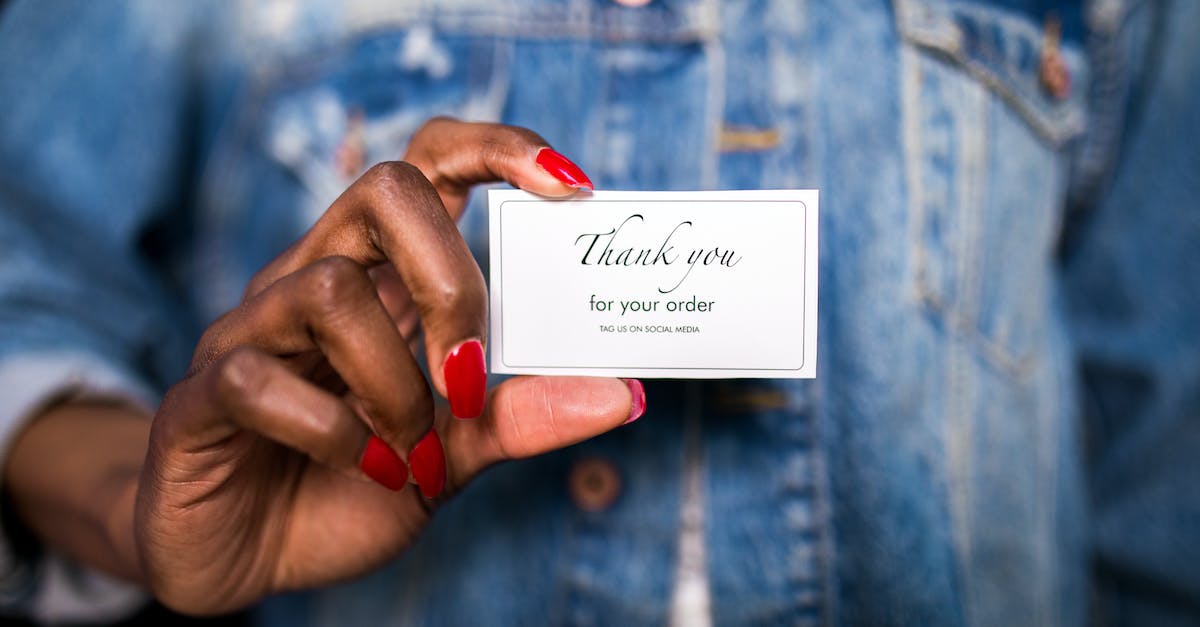 Returning a Card to hand & Charge - Person Holding White and Black Card Returning a Card to hand & Charge - Person Holding White and Black Card
