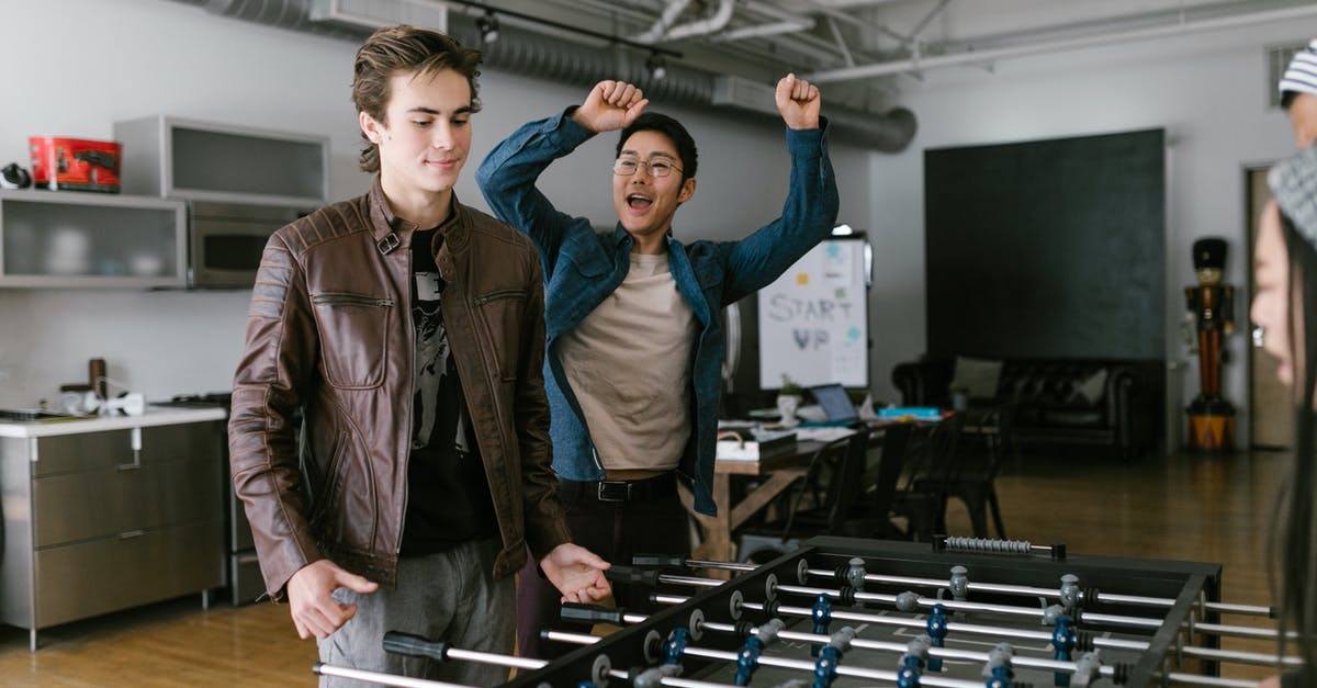 Reusing codes when selling game - Man in Brown Leather Jacket Standing Beside Woman in Blue Shirt Reusing codes when selling game - Man in Brown Leather Jacket Standing Beside Woman in Blue Shirt