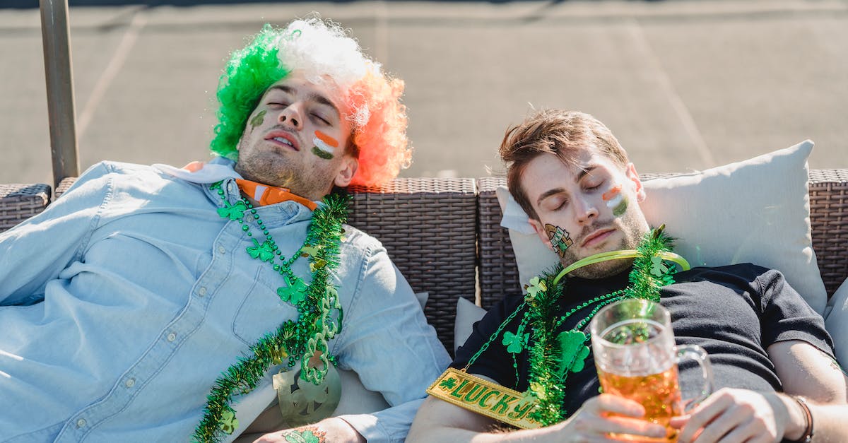 Richest clubs on football manager 2014 - Football fans resting with mug of beer on terrace of bar