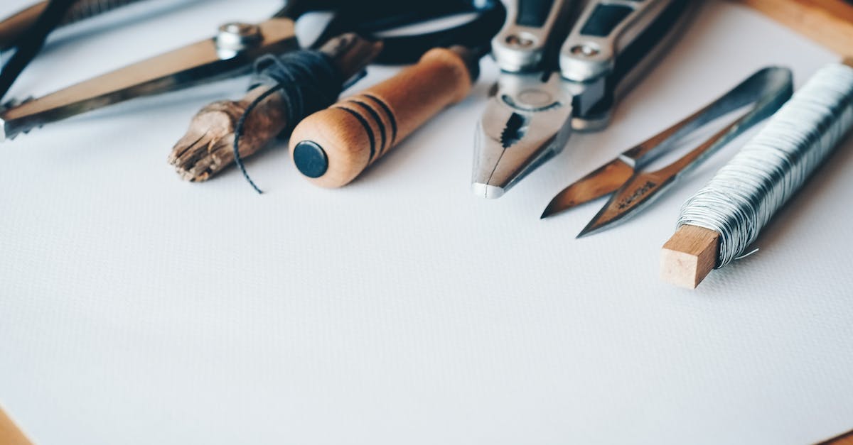 Rock, Paper Scissors with Cecilia - Several Handheld Tools on White Printer Paper