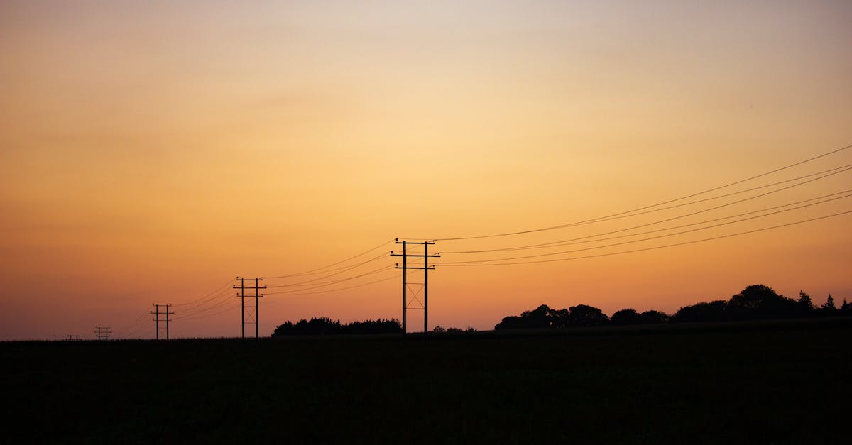 Rover power in KSP - Silhouetted Electricity Lines and Utility Poles at Sunset Rover power in KSP - Silhouetted Electricity Lines and Utility Poles at Sunset
