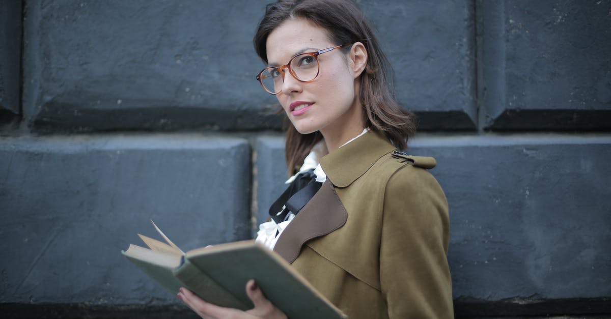 rs3 account gone with old school? - From below confident young female in glasses and elegant vintage clothes looking away and contemplating while reading rook on street near black wall of aged building in city rs3 account gone with old school? - From below confident young female in glasses and elegant vintage clothes looking away and contemplating while reading rook on street near black wall of aged building in city