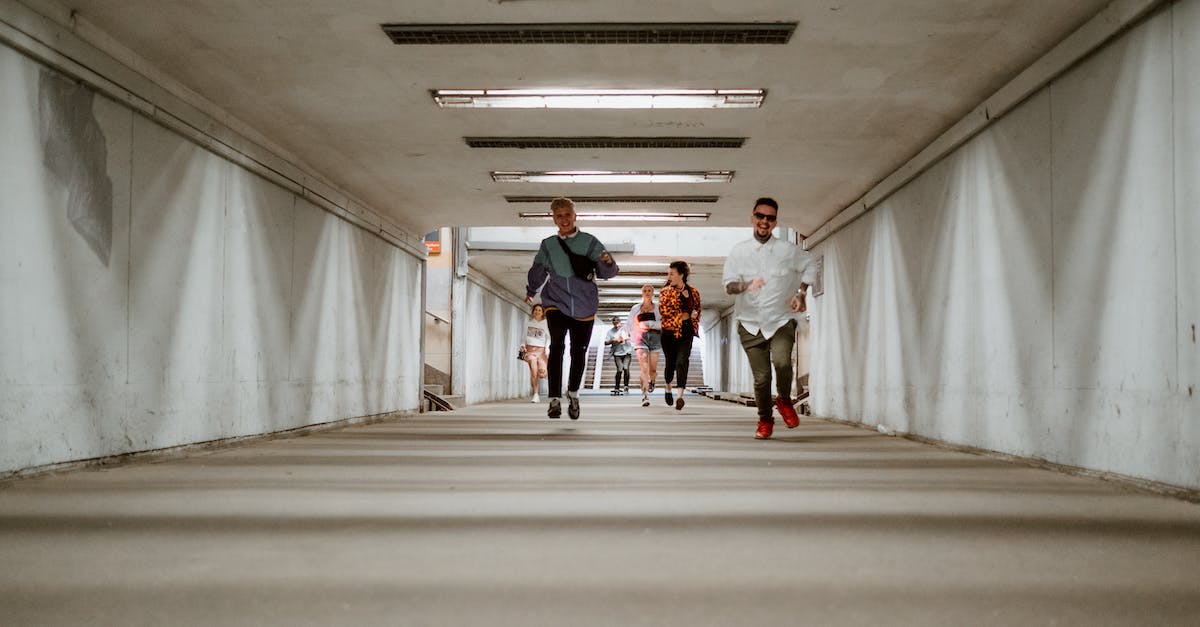 Running multiple unlocked crew skill missions - A Group of People Happily Running in the Underground Corridor