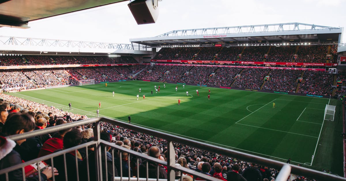 /scoreboard teams leave confuses players with teams - People Watching Football Match