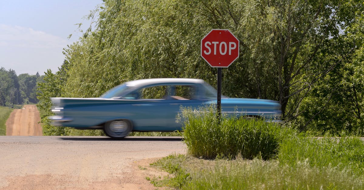 Screen freezing while fast traveling in Skyrim. How do I stop it? - A Blue Classic Car Passing by