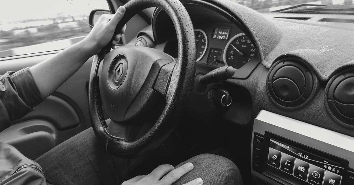 Screen freezing while fast traveling in Skyrim. How do I stop it? - Crop man driving car on road Screen freezing while fast traveling in Skyrim. How do I stop it? - Crop man driving car on road