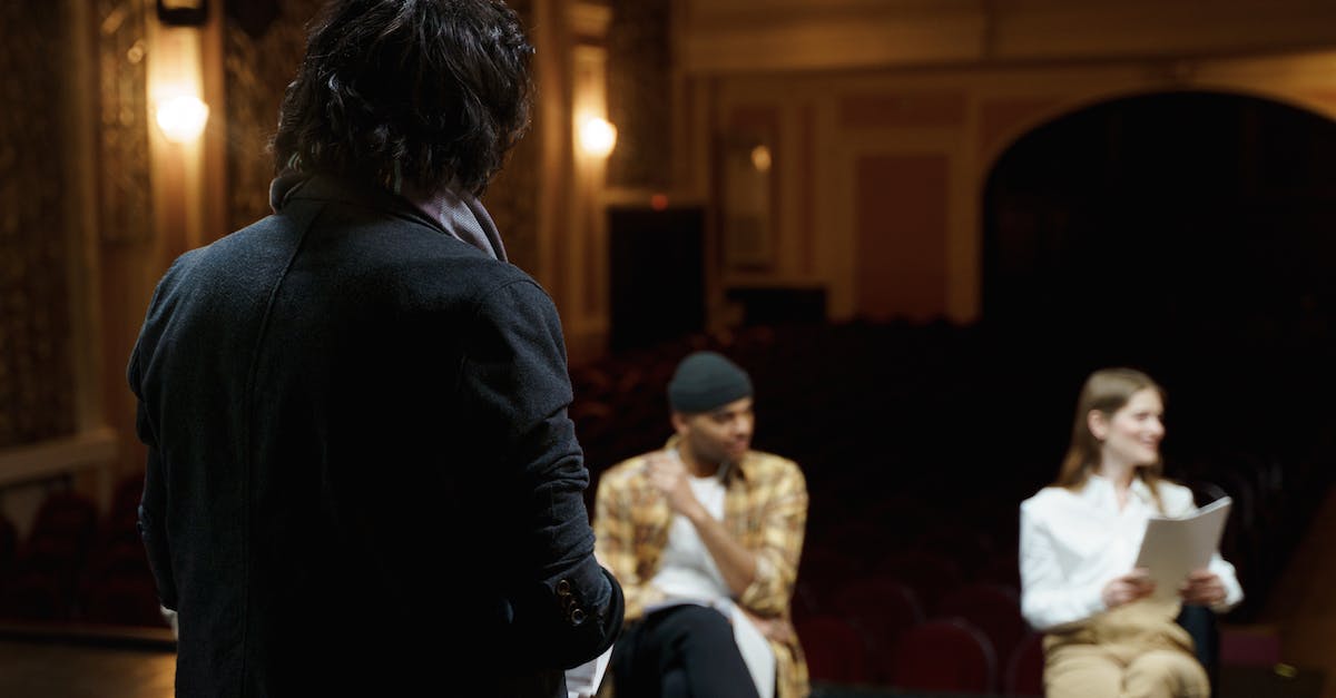 Script for Enigma to cast Midnight Pulse then ULT after blink? - Man in Black Suit Jacket Standing in Front of People Sitting on Chairs