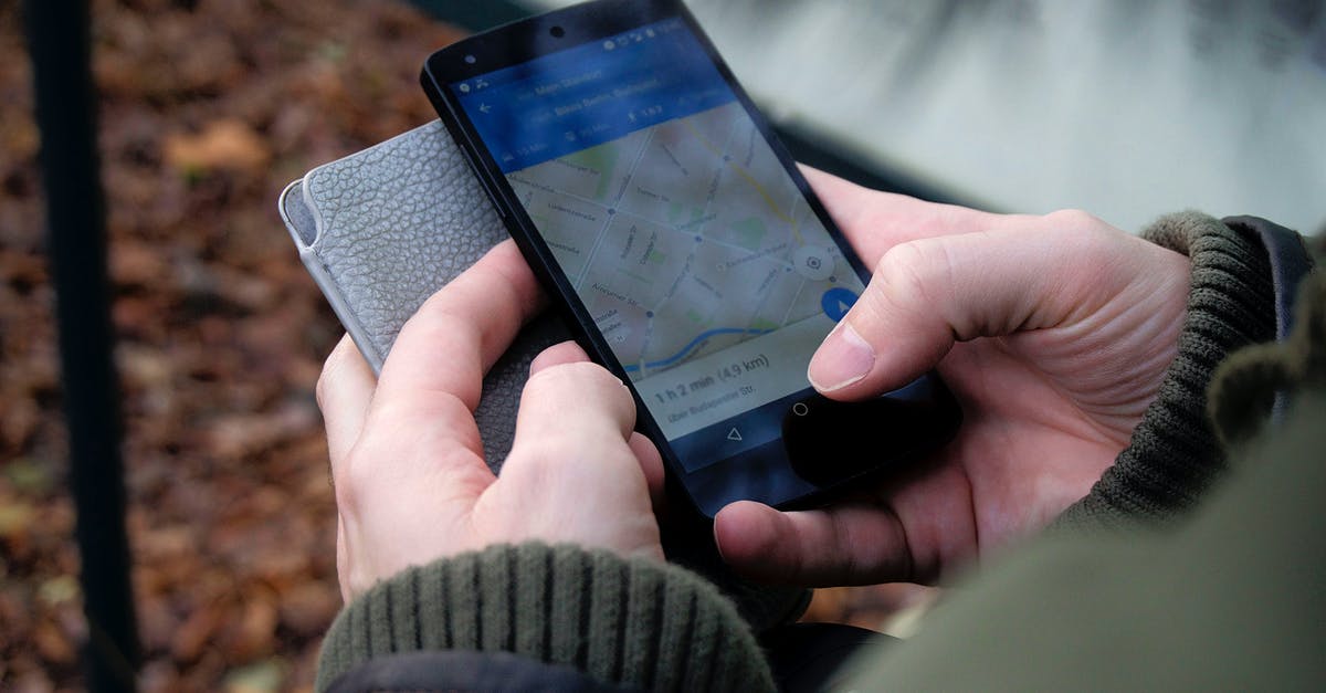 Searching for specific metadata in maps - Person Using Google Maps Application Through Black Android Smartphone Searching for specific metadata in maps - Person Using Google Maps Application Through Black Android Smartphone