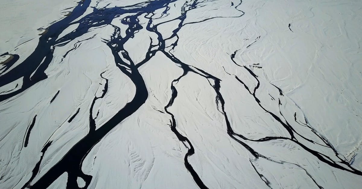 Season Ranking System XP Requirements - Drone view of snow covered terrain with picturesque glacial river system in winter Season Ranking System XP Requirements - Drone view of snow covered terrain with picturesque glacial river system in winter