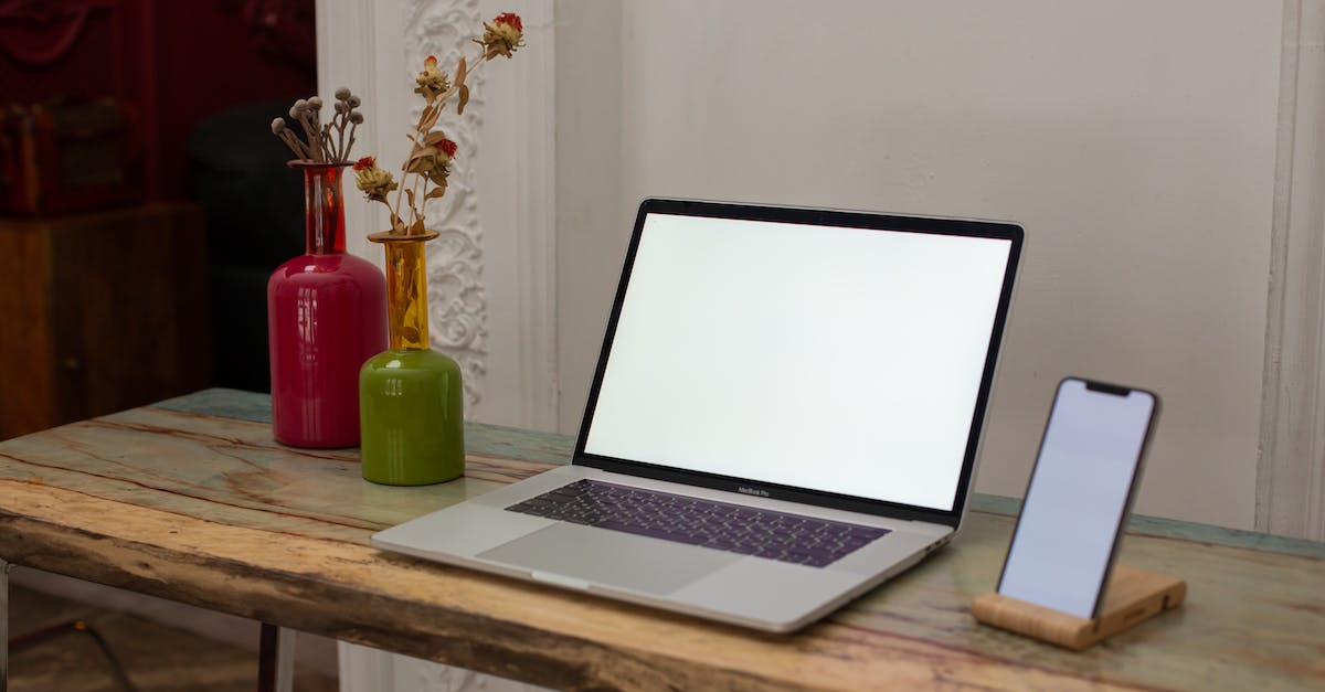 Second Monitor Lag - Macbook Pro on Brown Wooden Table Second Monitor Lag - Macbook Pro on Brown Wooden Table