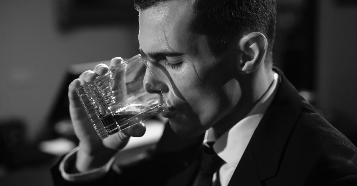 Seifer's Scar And Related Plot Points? [closed] - Close-Up Photo of Man Drinking Whiskey