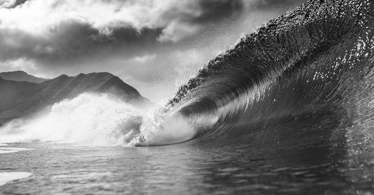 Sentinels of the Multiverse crash - Black and white of foamy wave falling into ocean with splashes against cloudy sky in summer day in nature outside Sentinels of the Multiverse crash - Black and white of foamy wave falling into ocean with splashes against cloudy sky in summer day in nature outside