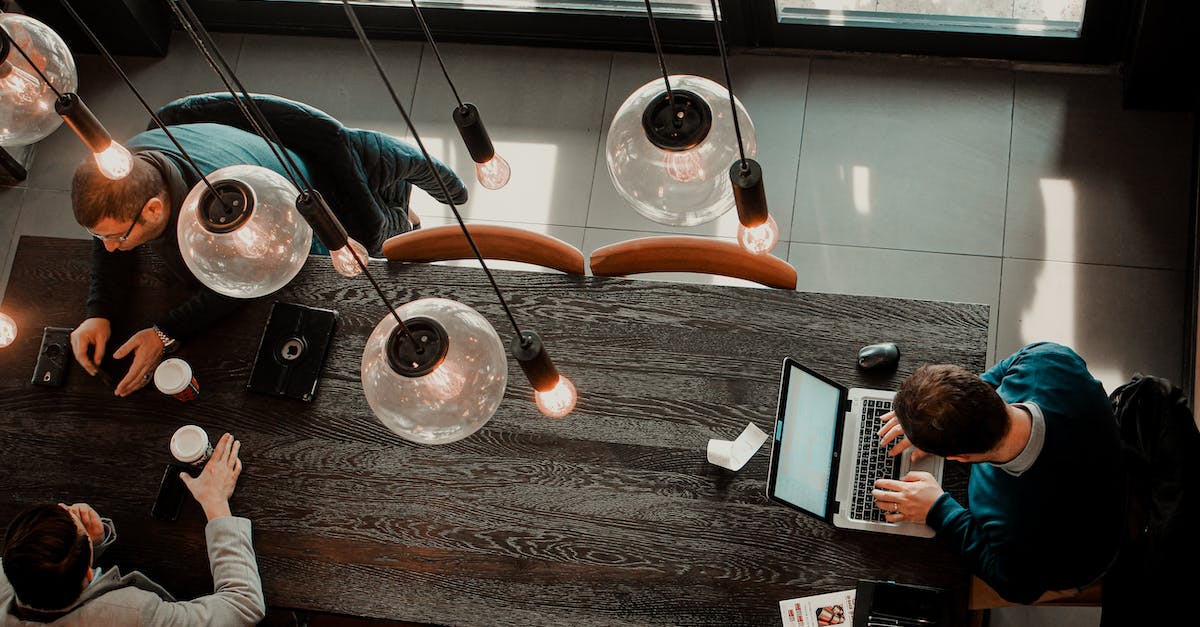 Separate world files for each person's profile using the minecraft launcher on that computer - Modern men in creative workspace with coffee and gadgets Separate world files for each person's profile using the minecraft launcher on that computer - Modern men in creative workspace with coffee and gadgets