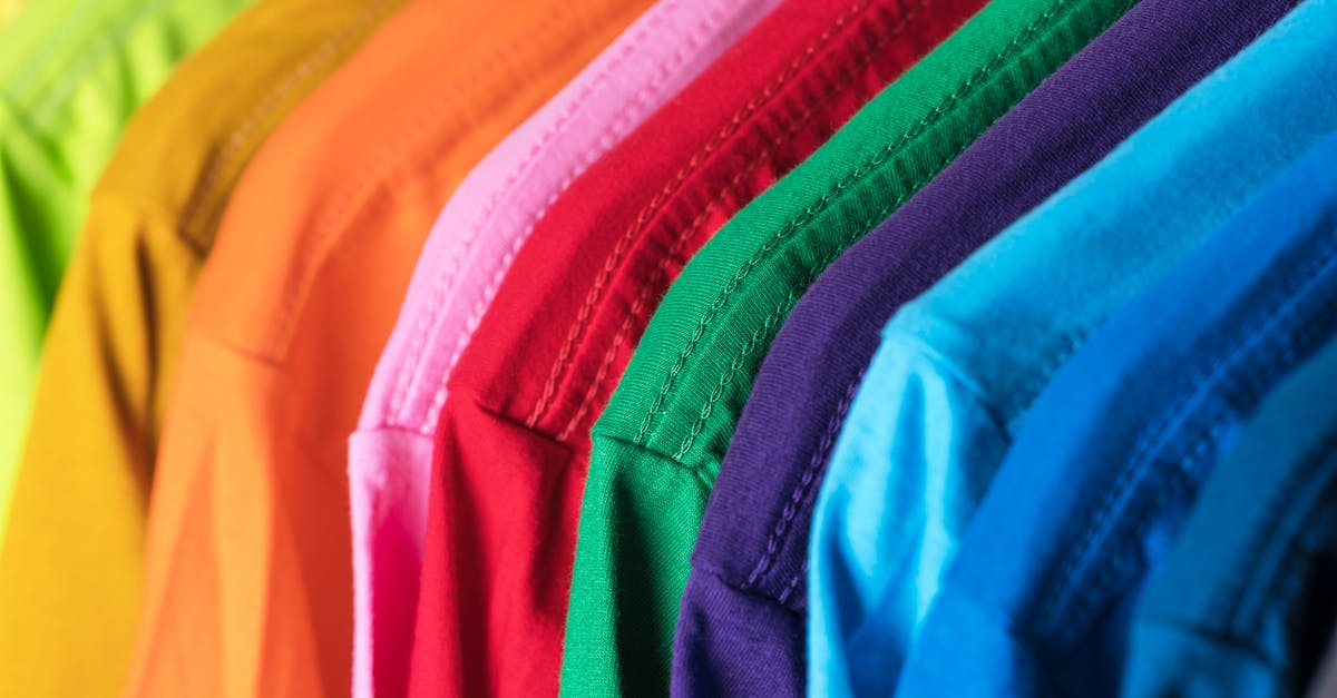 Set up a new hard drive for Playstation 3? - Closeup of multicolored vibrant cotton t shirts hanging in row in modern wardrobe Set up a new hard drive for Playstation 3? - Closeup of multicolored vibrant cotton t shirts hanging in row in modern wardrobe
