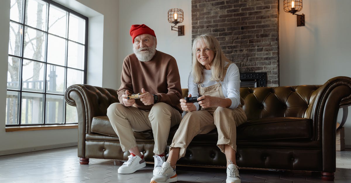 Setting choices without playing the previous games - Man and Woman Sitting on Brown Leather Couch Setting choices without playing the previous games - Man and Woman Sitting on Brown Leather Couch