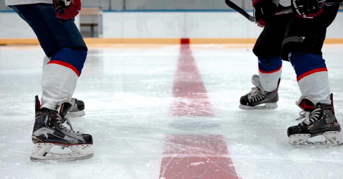 Shaking Off Players - Hockey Players Playing on Ice