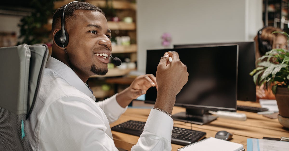 Share save files between computers - Man in White long Sleeve Shirt Sitting on Table with Computer