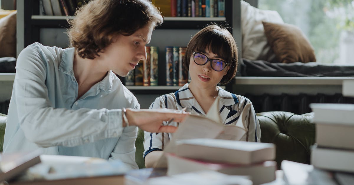 Sharing Ownership of Minecraft Education Edition - Girl in White School Uniform Reading Book