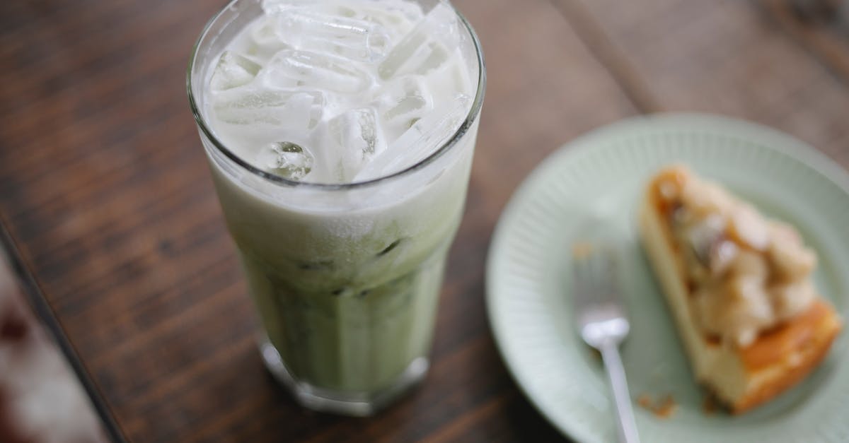 Shops refresh when? - Tasty iced matcha latte served with sweet pie Shops refresh when? - Tasty iced matcha latte served with sweet pie