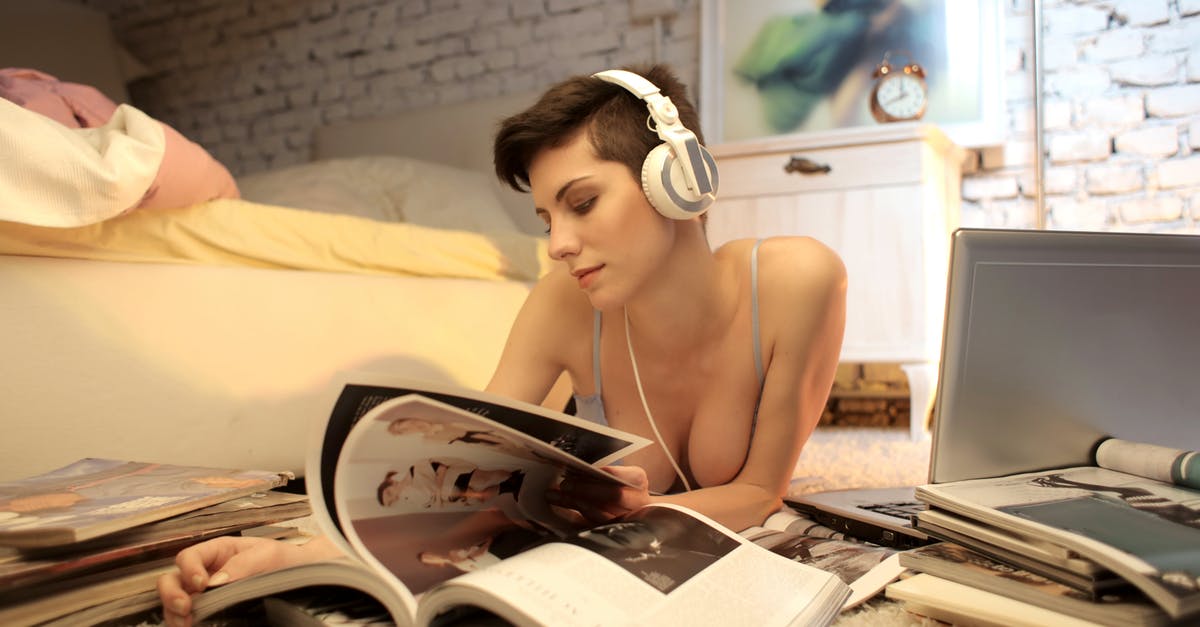 Should I read magazines directly after finding them? - Photo of Woman Lying on Floor While Reading Magazine Should I read magazines directly after finding them? - Photo of Woman Lying on Floor While Reading Magazine